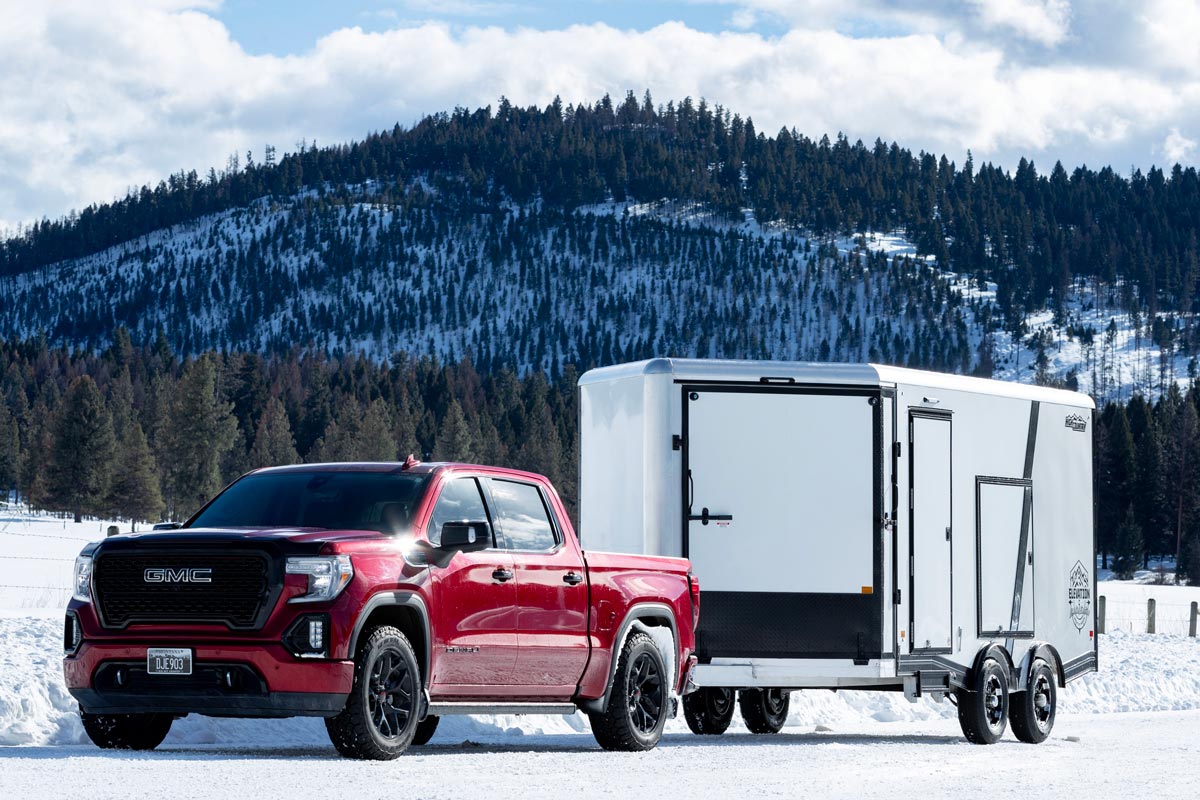 High Country Enclosed All-Sport Elevation Snow White Trailer With Red Truck